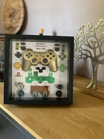 Cadre manette playstation 2 or