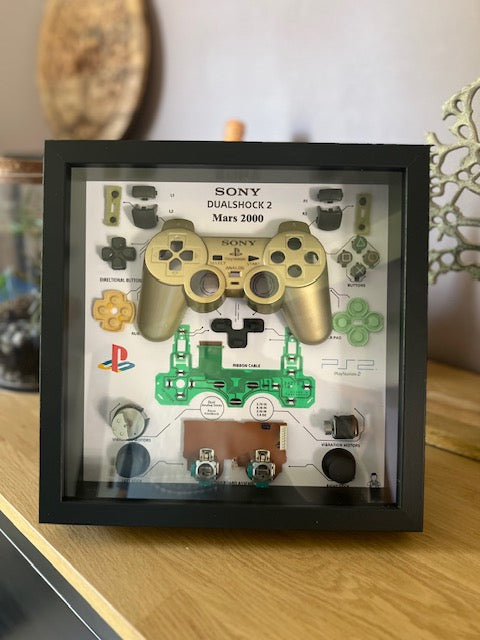 Cadre manette playstation 2 or
