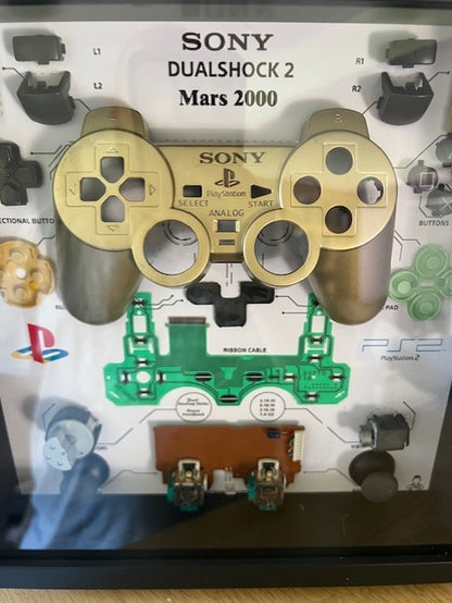 Cadre manette playstation 2 or